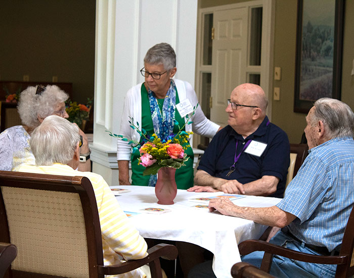 Rev. Cathy Lawerence with residents