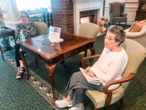 Glenwood Community residents catch up while practicing social distancing