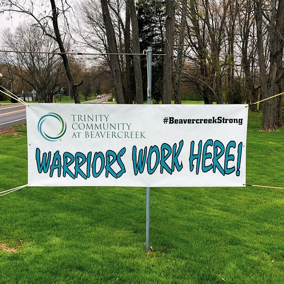 Trinity Community at Beavercreek Ohio Warriors Work Here Outdoor Sign