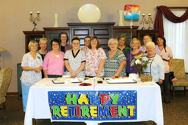 Margie Young and some of the Fairhaven team gather for a photo to help celebrate her retirement.