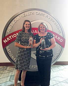 Barb Wolf of SEM Haven in Milford, Ohio, and Debbie Durbin of Chapel Hill Community in Canal Fulton, Ohio, receive their communities Silver Quality Awards