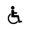 Icon of a person sitting in a wheelchair, depicted in black on a white background.